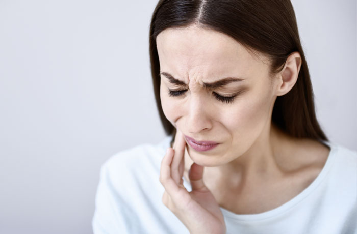 Schwerzen Kiefergelenk Knirschen Verspannung